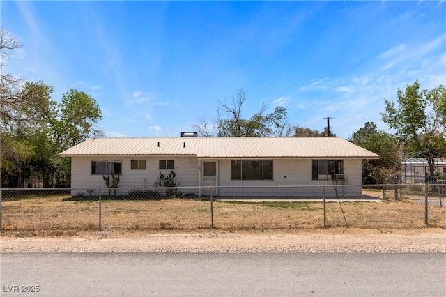 585 W Ingram Ave, Overton, NV 89040 - view of front of house with a metal roof and a fenced front yard