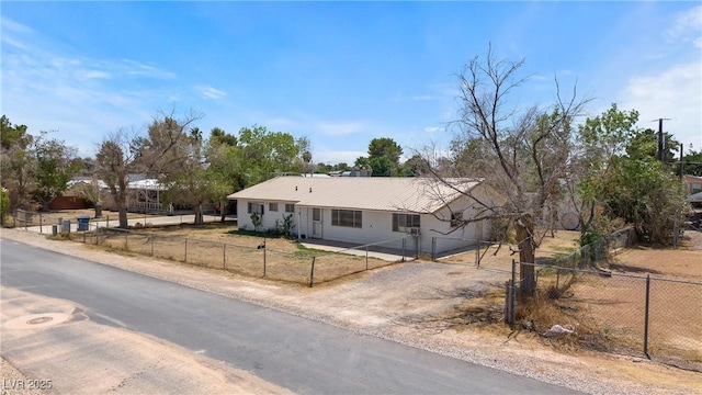 585 W Ingram Ave, Overton, NV 89040 - single story home featuring driveway, a metal roof, and a fenced front yard