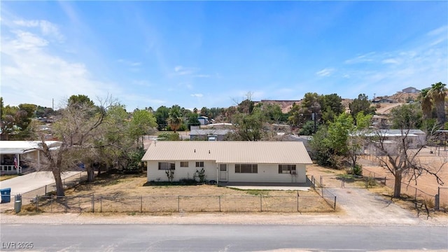 585 W Ingram Ave, Overton, NV 89040 - single story home with a fenced front yard and a metal roof