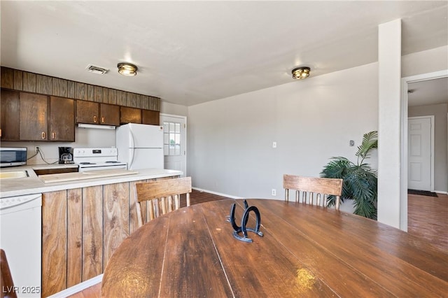 585 W Ingram Ave, Overton, NV 89040 - dining room with baseboards