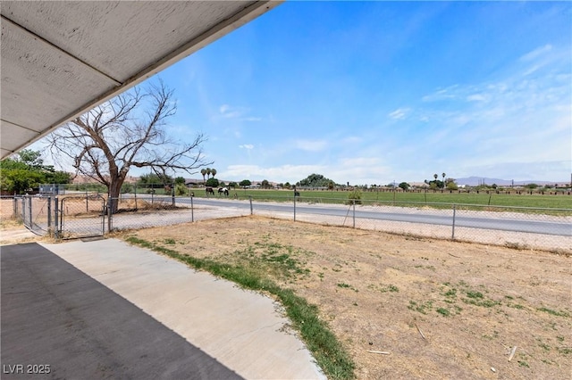 585 W Ingram Ave, Overton, NV 89040 - view of yard with a gate and a rural view