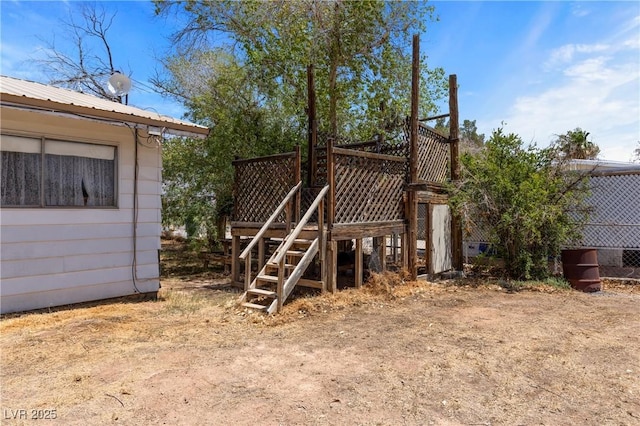 585 W Ingram Ave, Overton, NV 89040 - view of jungle gym featuring stairway and a wooden deck