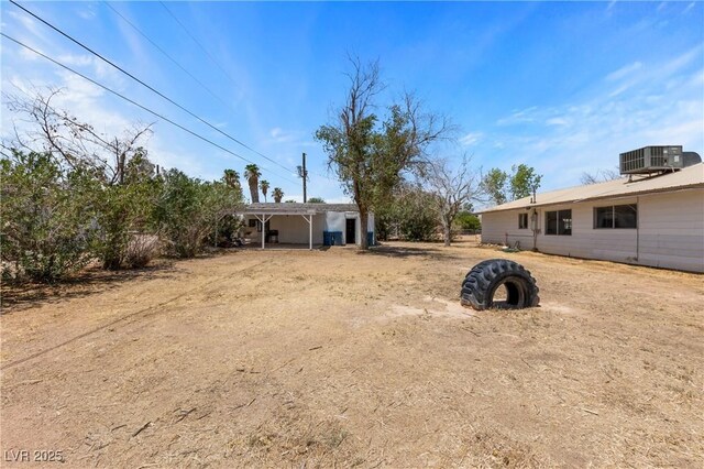 585 W Ingram Ave, Overton, NV 89040 - view of yard with a detached carport and dirt driveway