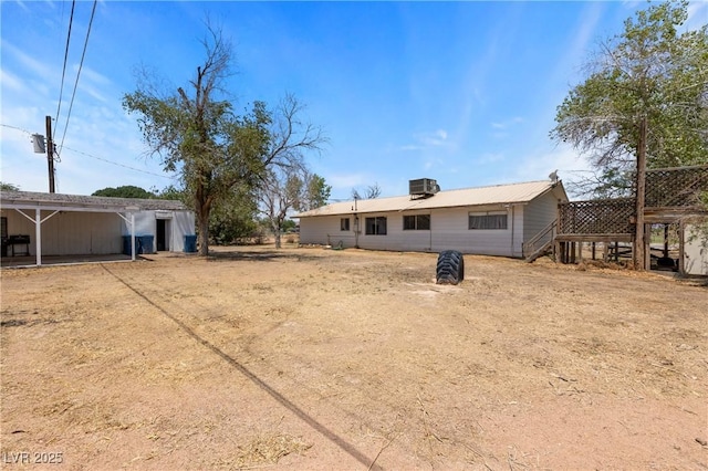 585 W Ingram Ave, Overton, NV 89040 - rear view of house featuring a detached carport