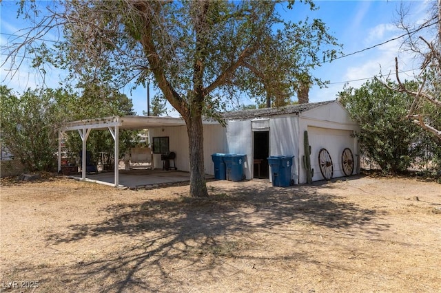 585 W Ingram Ave, Overton, NV 89040 - back of property with an outdoor structure