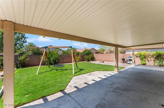 4837 River Splash Ave, Las Vegas, NV 89131 - fenced backyard with a patio area