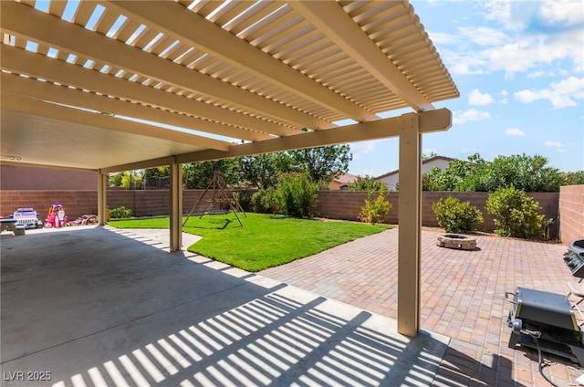 4837 River Splash Ave, Las Vegas, NV 89131 - fenced backyard featuring a patio area, an outdoor fire pit, and a pergola