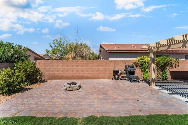 4837 River Splash Ave, Las Vegas, NV 89131 - view of patio / terrace with a fire pit and area for grilling