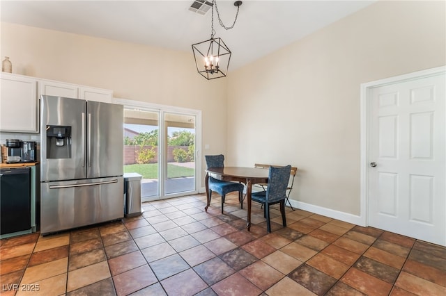 4837 River Splash Ave, Las Vegas, NV 89131 - dining area with a chandelier and baseboards