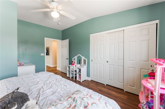 4837 River Splash Ave, Las Vegas, NV 89131 - bedroom featuring wood finished floors, a closet, vaulted ceiling, and a ceiling fan