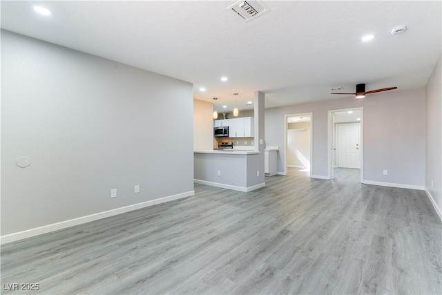 5800 Auborn Ave, Las Vegas, NV 89108 - unfurnished living room with light wood-type flooring, recessed lighting, and ceiling fan