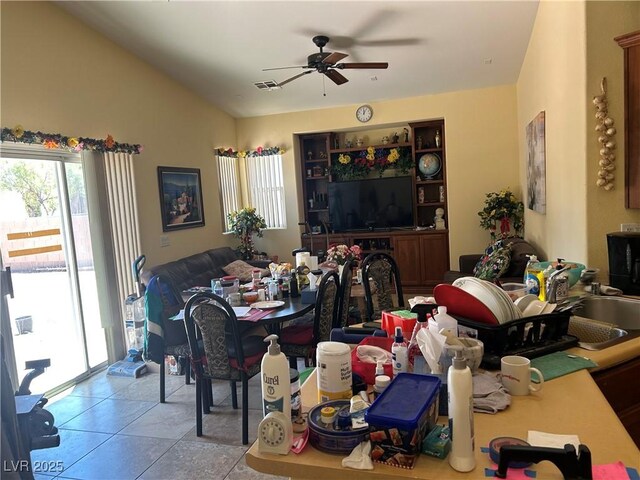 4620 Ventana Rey St, North Las Vegas, NV 89081 - dining room featuring a ceiling fan, lofted ceiling, and tile patterned floors