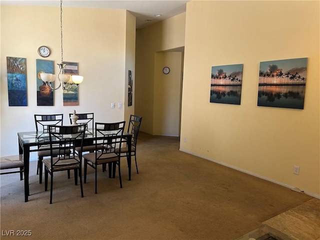4620 Ventana Rey St, North Las Vegas, NV 89081 - carpeted dining room with a chandelier and a high ceiling