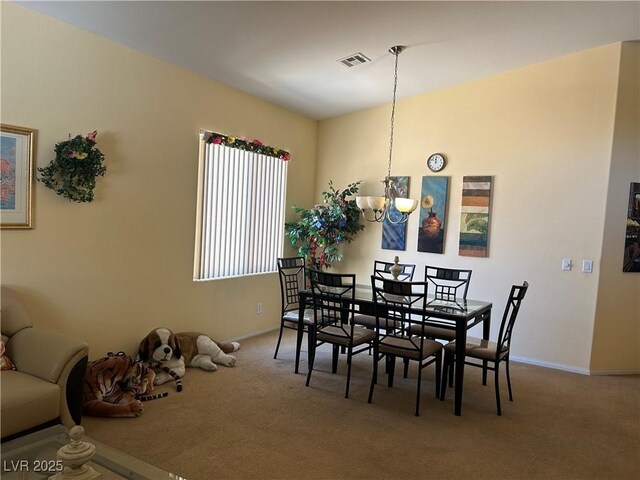 4620 Ventana Rey St, North Las Vegas, NV 89081 - carpeted dining space featuring a chandelier and baseboards