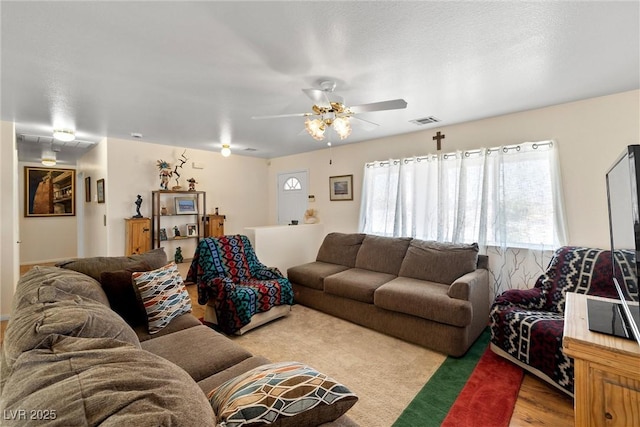 2730 Banyon St, Pahrump, NV 89048 - living area featuring healthy amount of natural light and a ceiling fan