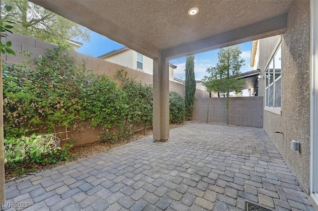 9327 Ettrick Ct, Las Vegas, NV 89178 - fenced backyard with a patio