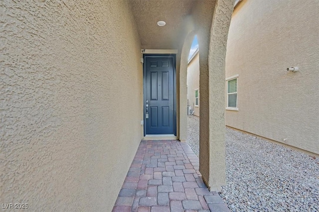 9327 Ettrick Ct, Las Vegas, NV 89178 - doorway to property with stucco siding