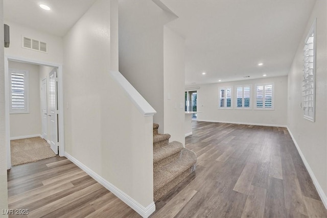 9327 Ettrick Ct, Las Vegas, NV 89178 - staircase with wood finished floors and recessed lighting
