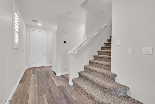 9327 Ettrick Ct, Las Vegas, NV 89178 - entryway with wood finished floors, stairs, and recessed lighting