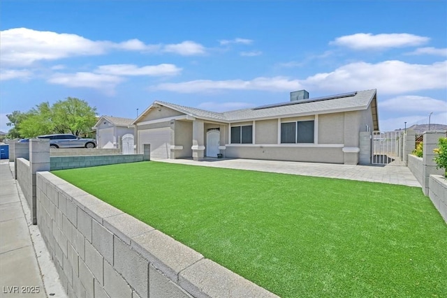 808 Vermillion Dr, Henderson, NV 89002 - view of front facade with solar panels, stucco siding, a gate, and a garage