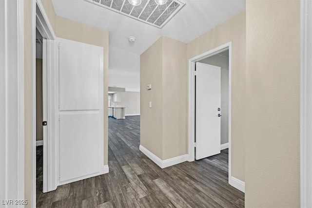 808 Vermillion Dr, Henderson, NV 89002 - corridor with dark wood-style floors and baseboards