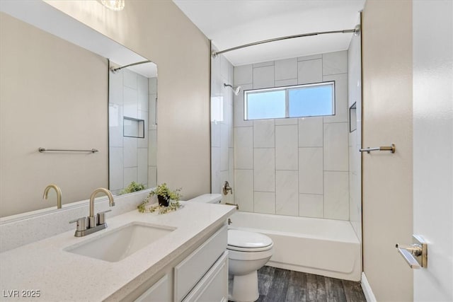 808 Vermillion Dr, Henderson, NV 89002 - bathroom featuring vanity, tub / shower combination, and wood finished floors