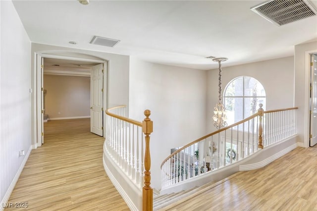 9905 Fox Springs Dr, Las Vegas, NV 89117 - hall with an upstairs landing and light wood-style flooring