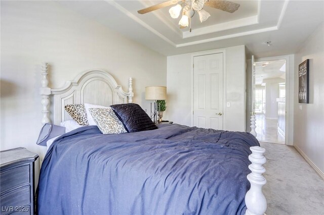 9905 Fox Springs Dr, Las Vegas, NV 89117 - carpeted bedroom with a raised ceiling and ceiling fan