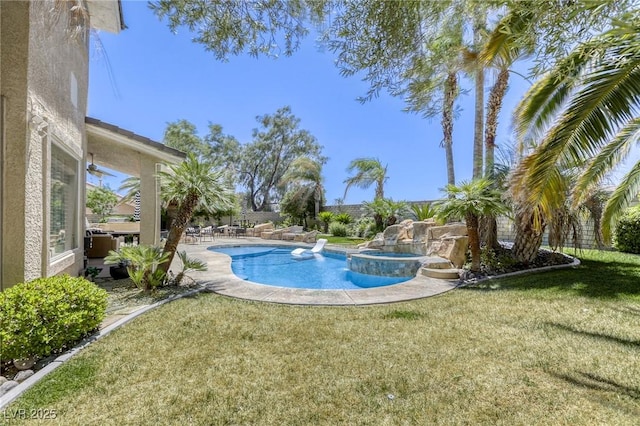 9905 Fox Springs Dr, Las Vegas, NV 89117 - view of pool featuring a lawn, a patio area, and a pool with connected hot tub
