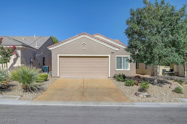 7916 Lyrebird Dr, North Las Vegas, NV 89084 - ranch-style house with an attached garage, concrete driveway, and stucco siding