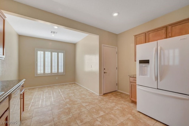 7916 Lyrebird Dr, North Las Vegas, NV 89084 - kitchen with white appliances, recessed lighting, and light tile patterned floors