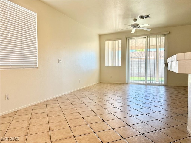 338 Brilliant Summit Cir, Henderson, NV 89052 - spare room featuring ceiling fan and light tile patterned flooring