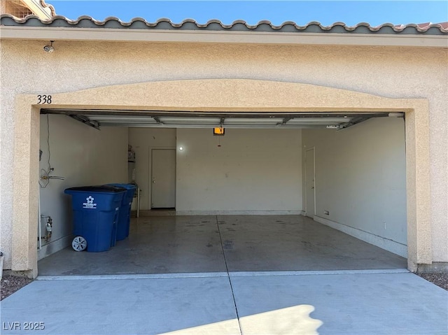 338 Brilliant Summit Cir, Henderson, NV 89052 - garage featuring a garage door opener