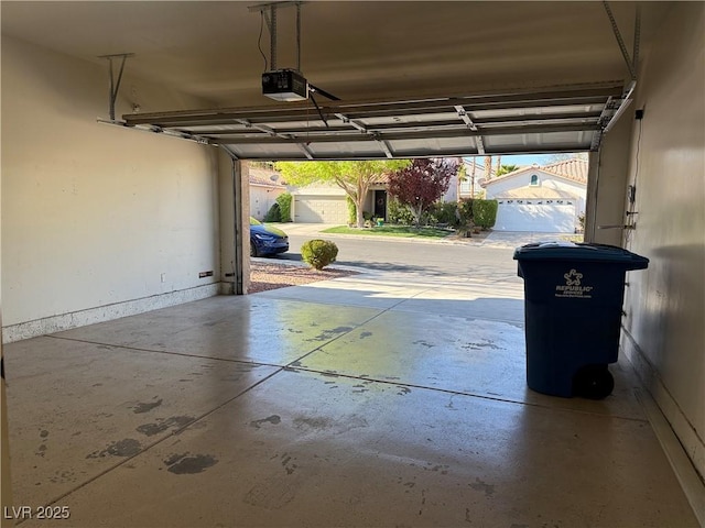 338 Brilliant Summit Cir, Henderson, NV 89052 - garage featuring a garage door opener