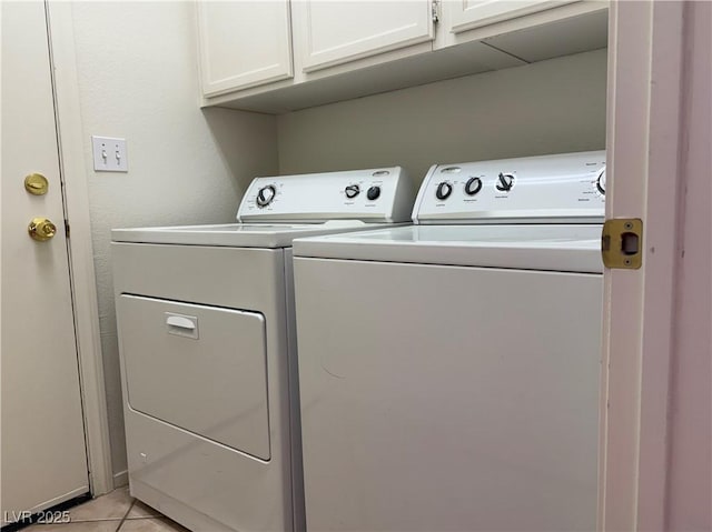 338 Brilliant Summit Cir, Henderson, NV 89052 - washroom featuring washing machine and dryer, cabinet space, and light tile patterned floors
