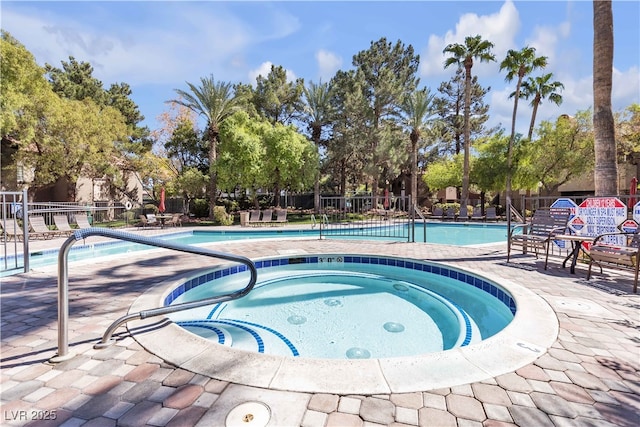 9000 Las Vegas Blvd Unit 1287, Las Vegas, NV 89123 - community pool with a hot tub, a patio area, and view of wooded area