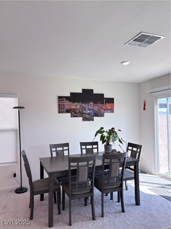 4993 Birchland Manor Ave, Las Vegas, NV 89139 - dining area with carpet floors