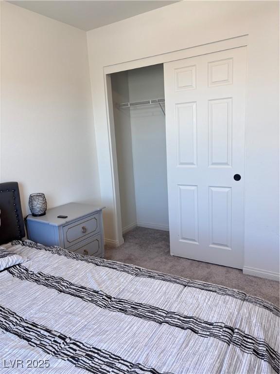 4993 Birchland Manor Ave, Las Vegas, NV 89139 - bedroom featuring a closet and carpet