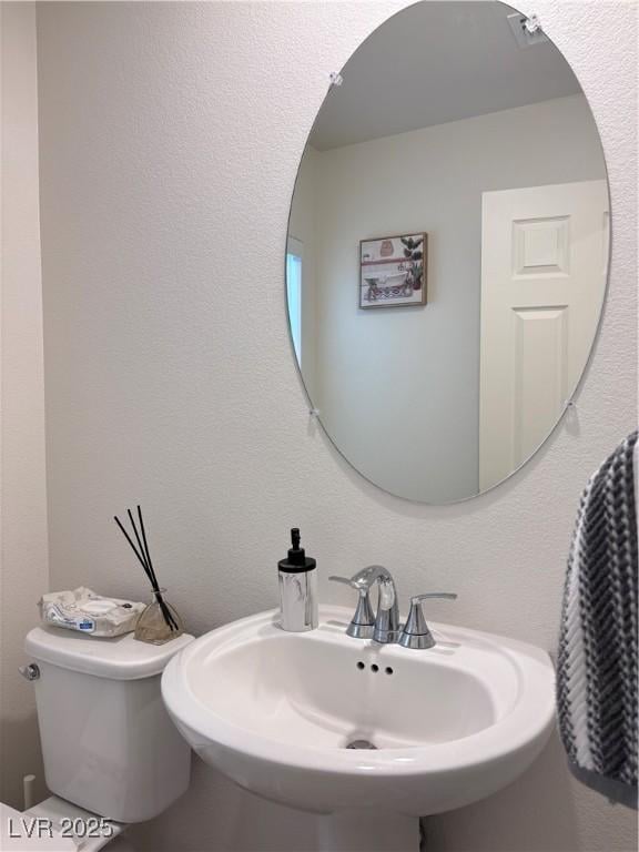 4993 Birchland Manor Ave, Las Vegas, NV 89139 - half bath with a sink and toilet