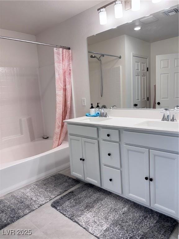 4993 Birchland Manor Ave, Las Vegas, NV 89139 - bathroom featuring shower / bath combination with curtain, double vanity, and tile patterned floors