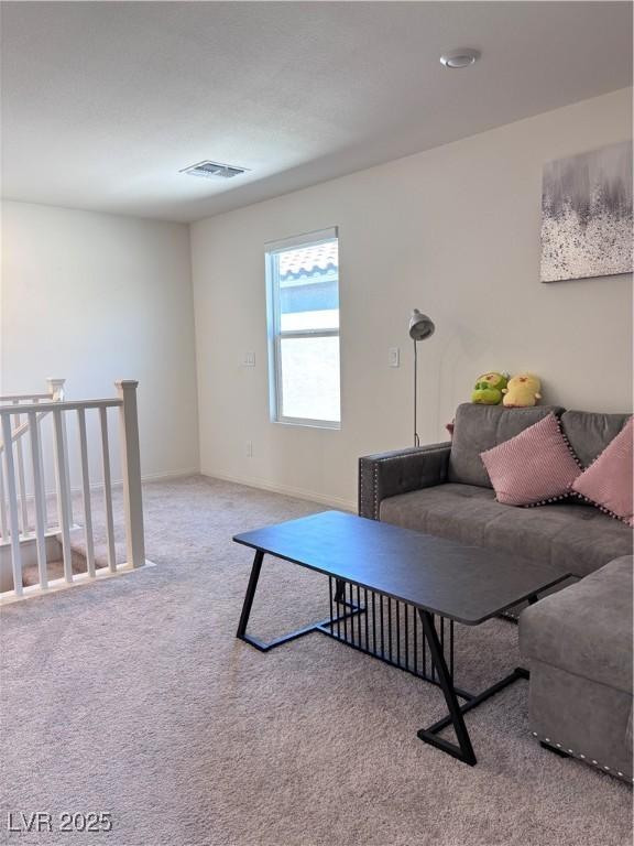 4993 Birchland Manor Ave, Las Vegas, NV 89139 - living room featuring carpet