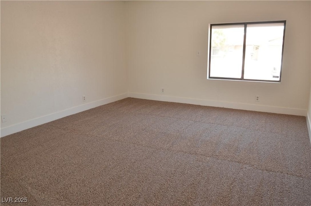 4277 Rimcrest Rd, Las Vegas, NV 89121 - carpeted empty room featuring baseboards