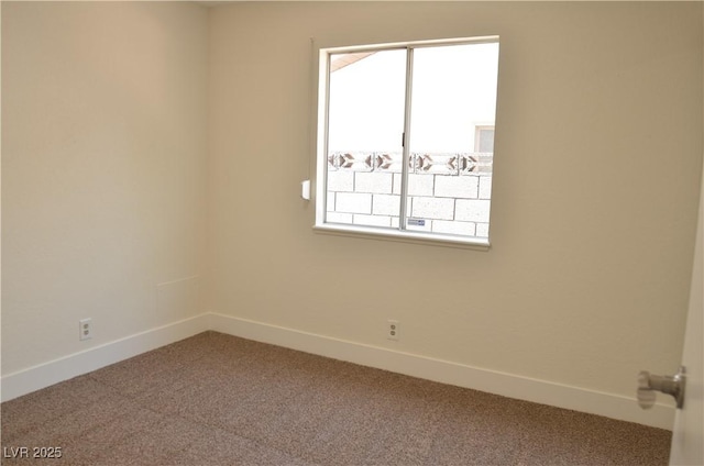 4277 Rimcrest Rd, Las Vegas, NV 89121 - carpeted empty room with baseboards