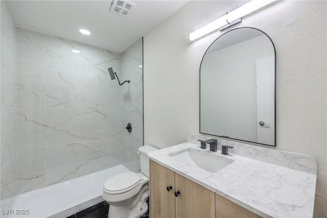 4277 Rimcrest Rd, Las Vegas, NV 89121 - bathroom featuring vanity and a marble finish shower
