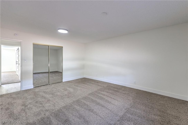 4277 Rimcrest Rd, Las Vegas, NV 89121 - unfurnished bedroom featuring carpet flooring and a closet
