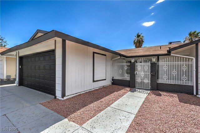 4277 Rimcrest Rd, Las Vegas, NV 89121 - view of front of home with a gate and an attached garage
