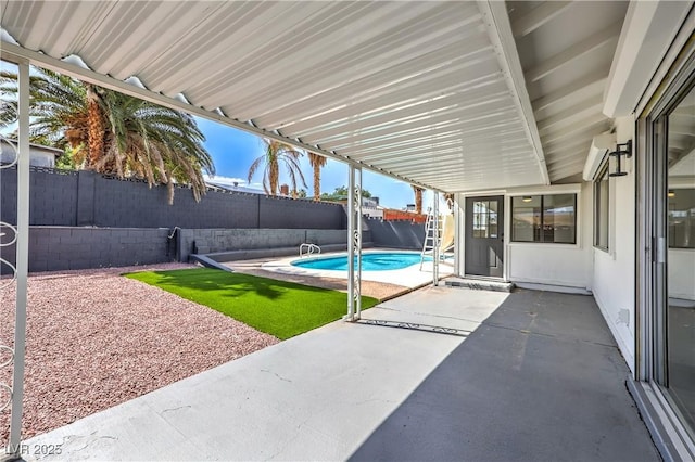 4277 Rimcrest Rd, Las Vegas, NV 89121 - fenced backyard with a patio area