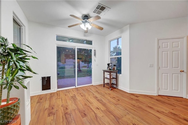 8812 Glenistar Gate Ave, Las Vegas, NV 89143 - empty room with light wood-style flooring and ceiling fan