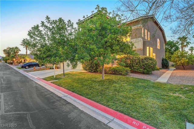 8812 Glenistar Gate Ave, Las Vegas, NV 89143 - view of front of home featuring a front yard and concrete driveway