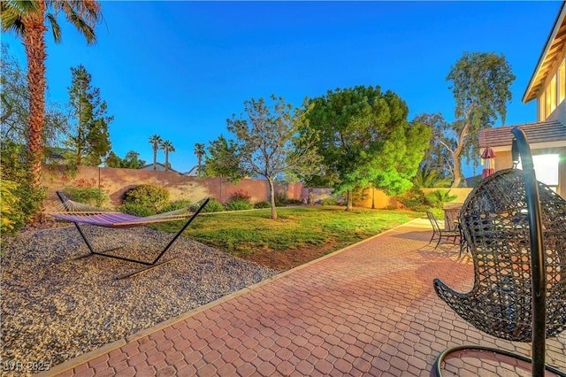 8812 Glenistar Gate Ave, Las Vegas, NV 89143 - fenced backyard with a patio area